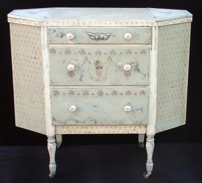 Ivory and green sewing cabinet; circa 1940s.